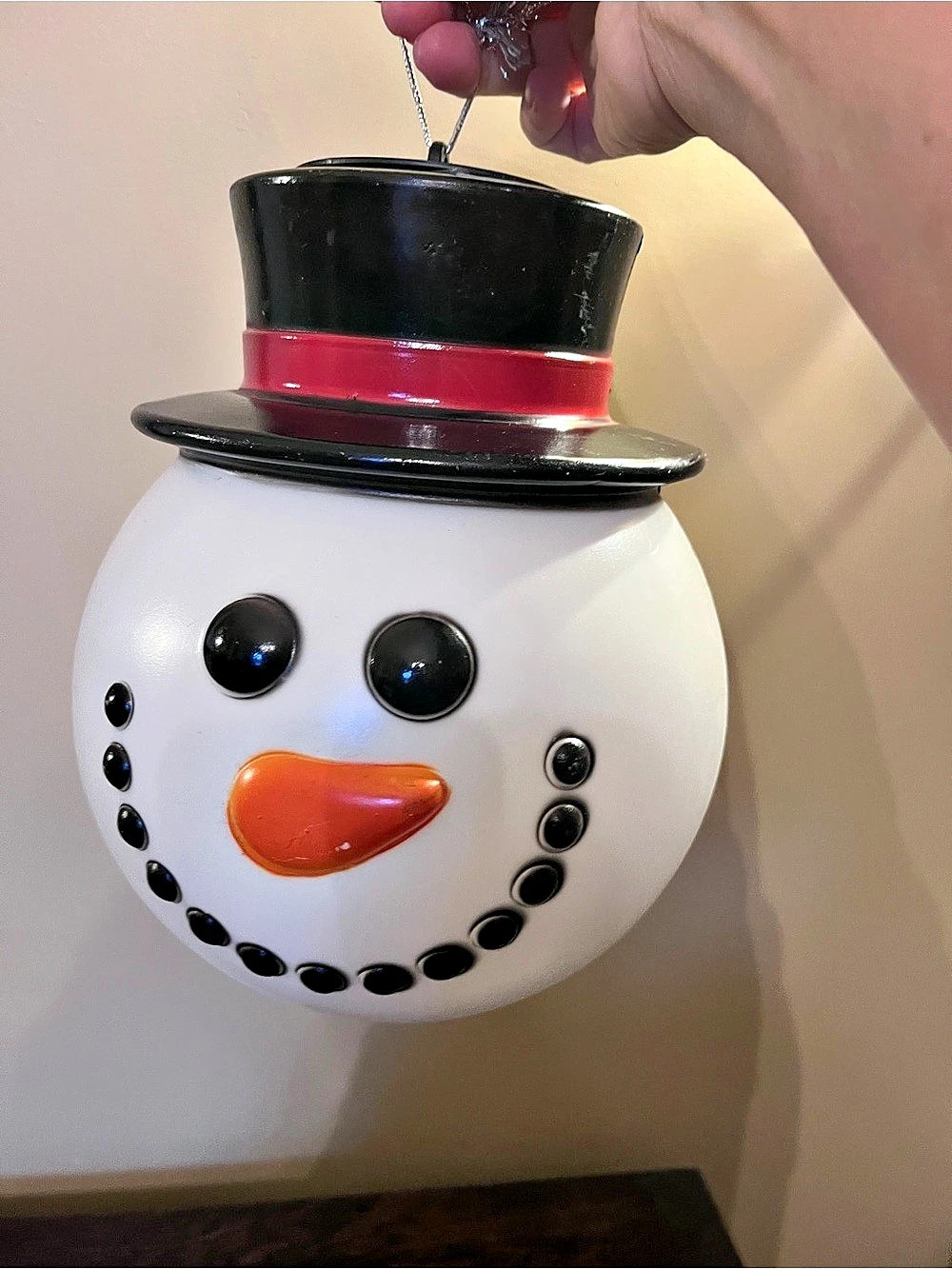 Brighten Up Your Holidays with This Jolly Blow Mold Light Snowman Hanging Head